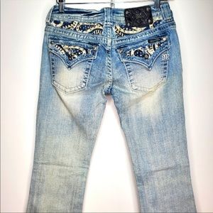 Light denim low waisted Miss Me Bootcut Jeans 
Size 28 Inseam 30